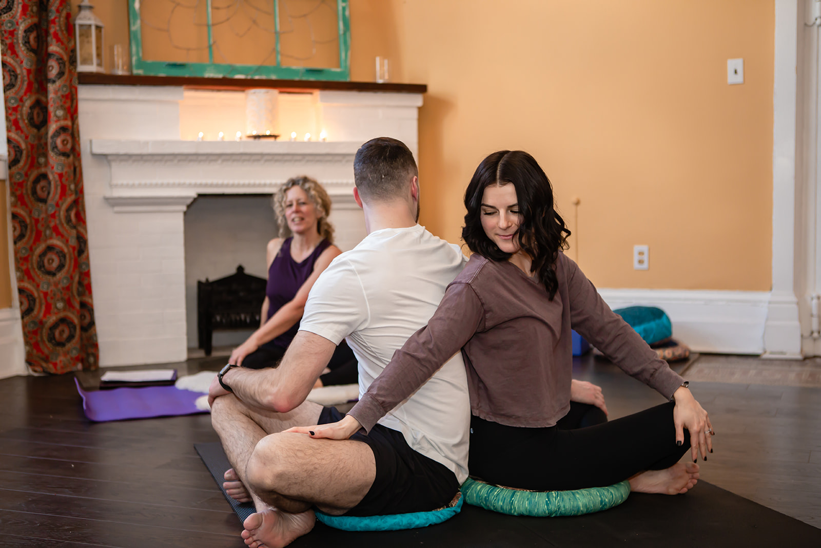partner yoga at We Thrive